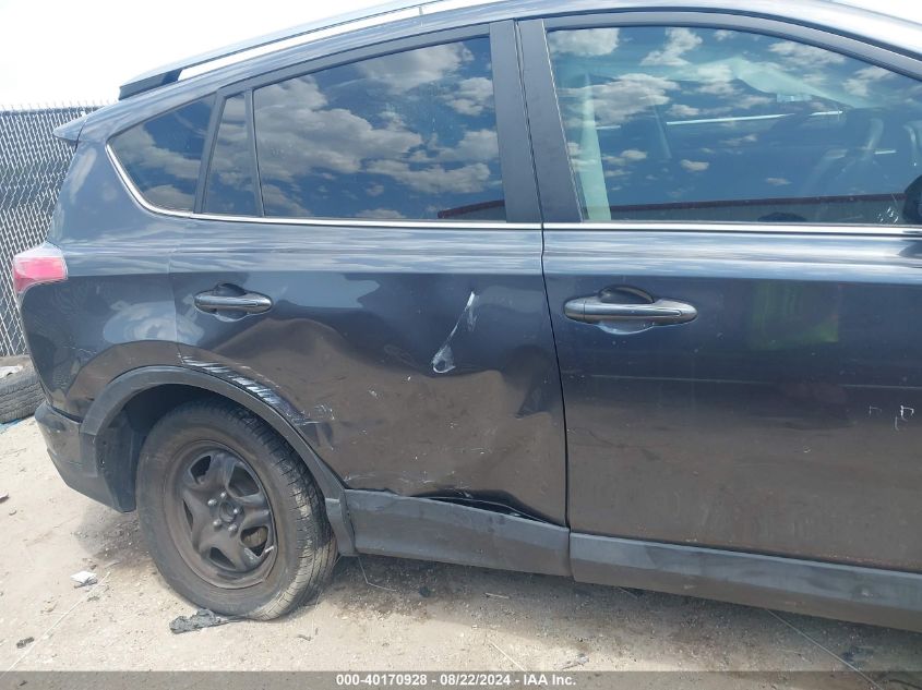 VIN JTMZFREVXJJ209126 2018 TOYOTA RAV4 LE
