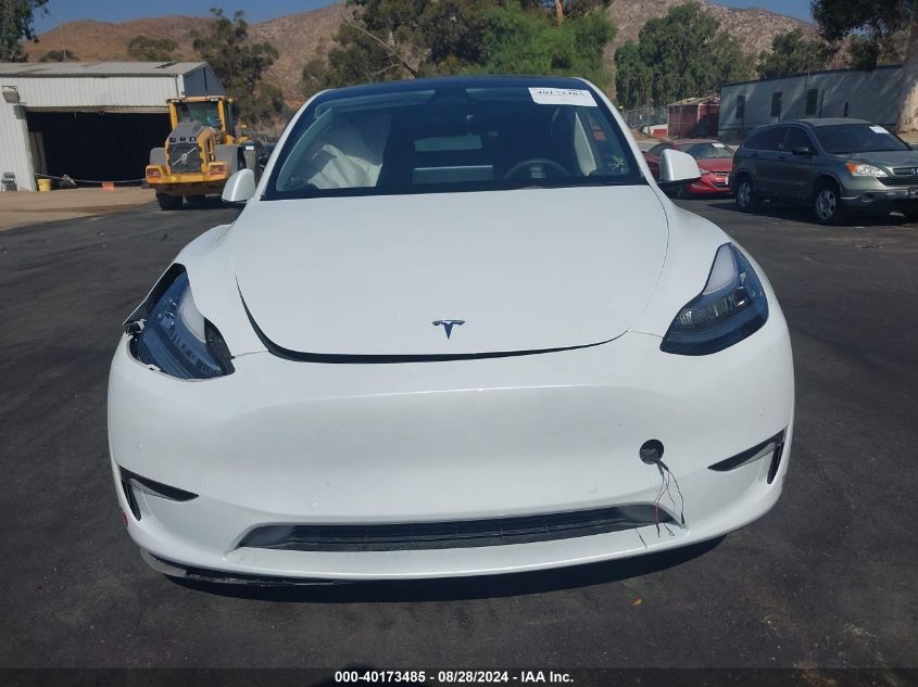 2022 Tesla Model Y Long Range Dual Motor All-Wheel Drive VIN: 7SAYGAEE4NF569521 Lot: 40173485