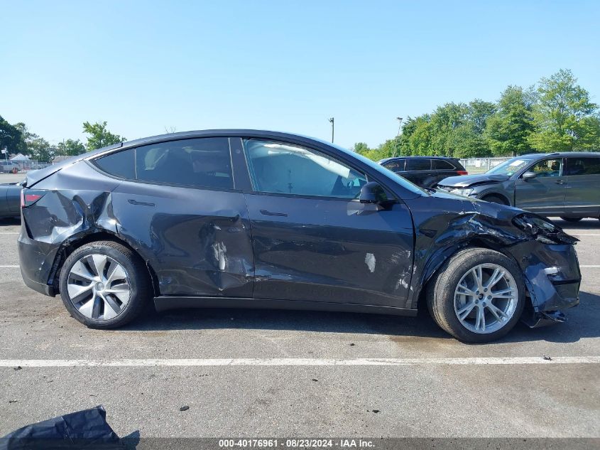 2024 Tesla Model Y Long Range Dual Motor All-Wheel Drive VIN: 7SAYGDEE0RA278597 Lot: 40176961