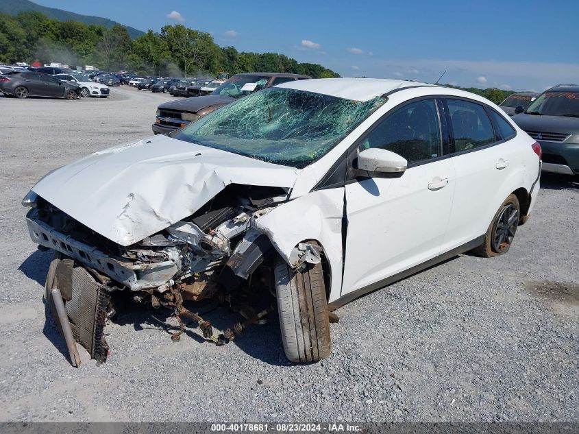 2016 Ford Focus Se VIN: 1FADP3F21GL384960 Lot: 40178681