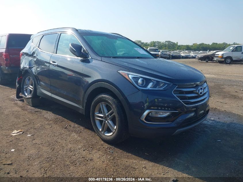 5NMZUDLB8JH102051 2018 HYUNDAI SANTA FE - Image 1