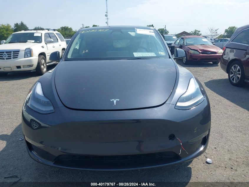 2024 Tesla Model Y Long Range Dual Motor All-Wheel Drive VIN: 7SAYGDEE6RA231722 Lot: 40179767