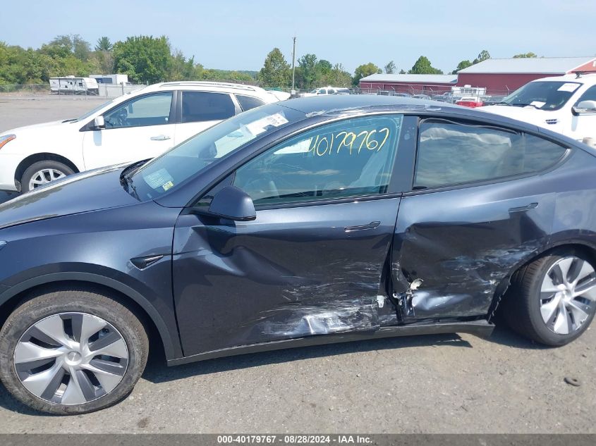 2024 Tesla Model Y Long Range Dual Motor All-Wheel Drive VIN: 7SAYGDEE6RA231722 Lot: 40179767