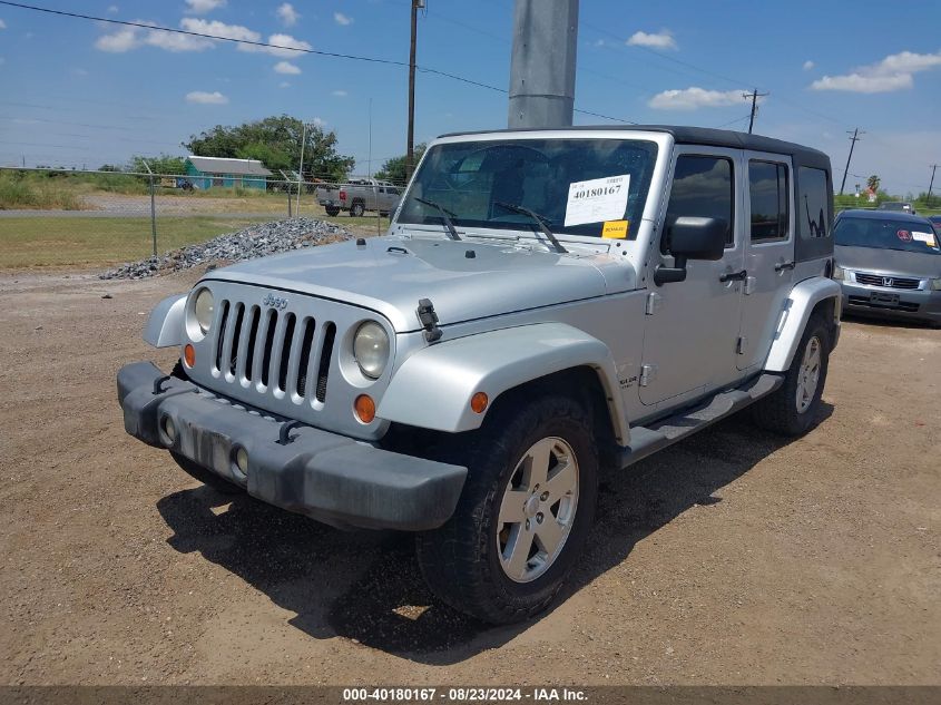 2007 Jeep Wrangler Unlimited Sahara VIN: 1J4GB59137L142136 Lot: 40180167