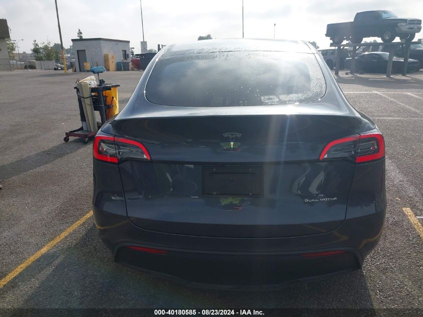 2023 Tesla Model Y Awd/Long Range Dual Motor All-Wheel Drive VIN: 7SAYGDEE2PA075711 Lot: 40180585