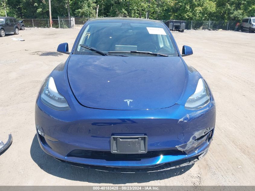 2023 Tesla Model Y Awd/Long Range Dual Motor All-Wheel Drive VIN: 7SAYGDEE1PA030579 Lot: 40183425