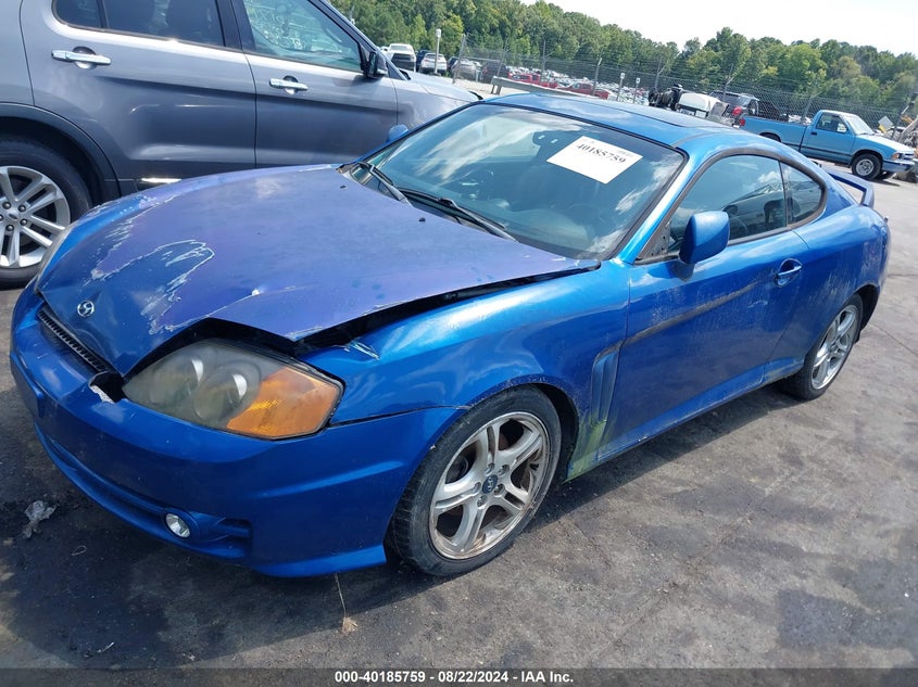 2004 Hyundai Tiburon Gt V6/Gt V6 Special Edition VIN: KMHHN65F54U111013 Lot: 40185759