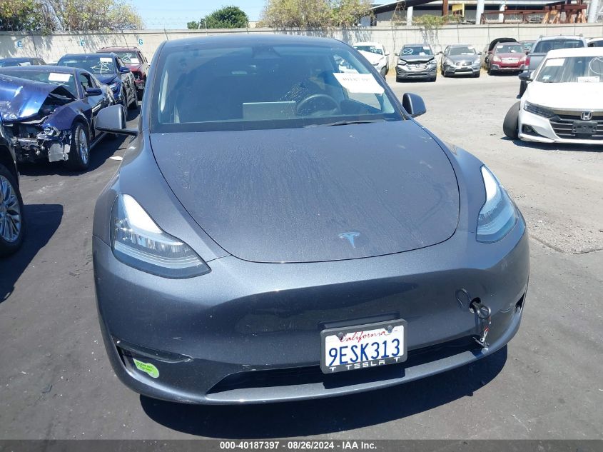 2023 Tesla Model Y Awd/Long Range Dual Motor All-Wheel Drive VIN: 7SAYGDEE9PA047291 Lot: 40187397