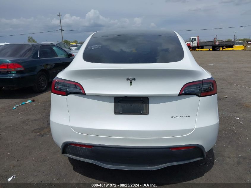 2023 Tesla Model Y Awd/Long Range Dual Motor All-Wheel Drive VIN: 7SAYGDEE4PF623534 Lot: 40191972