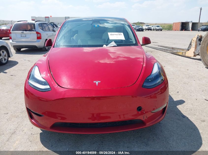 2023 Tesla Model Y VIN: 7SAYGDEE8PA157412 Lot: 40194589