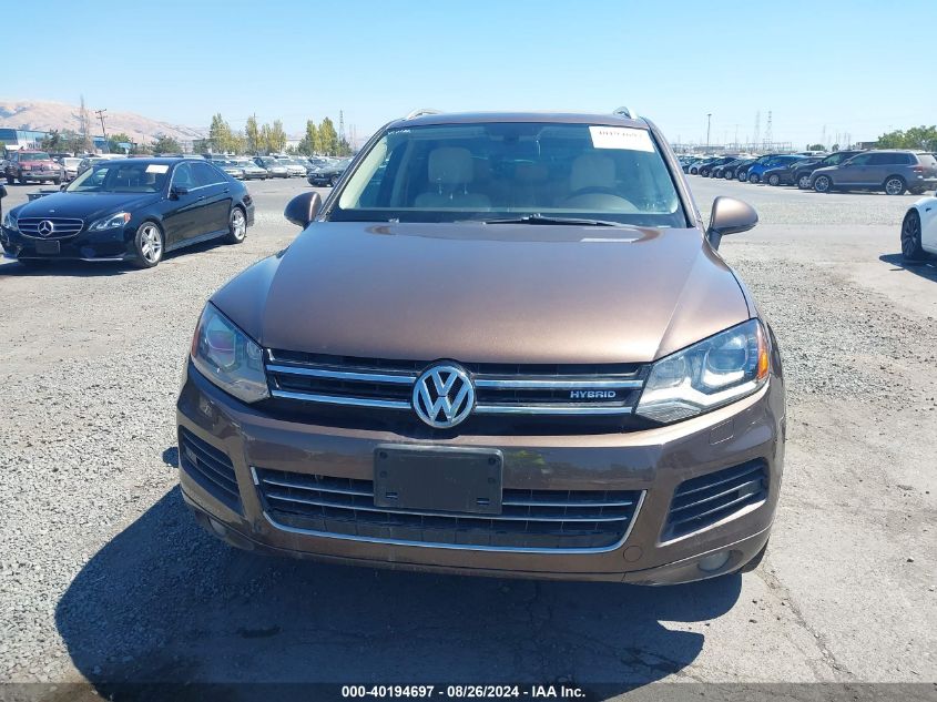 2013 Volkswagen Touareg Hybrid VIN: WVGEG9BP5DD010517 Lot: 40194697