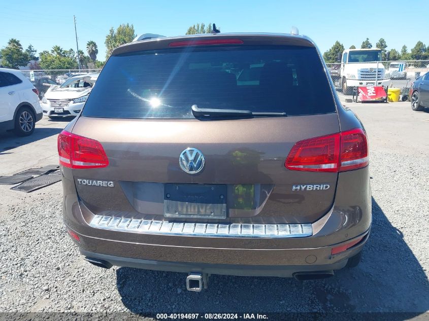 2013 Volkswagen Touareg Hybrid VIN: WVGEG9BP5DD010517 Lot: 40194697