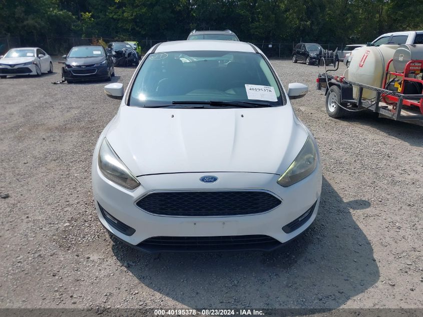 2015 Ford Focus Se VIN: 1FADP3K25FL318934 Lot: 40195378