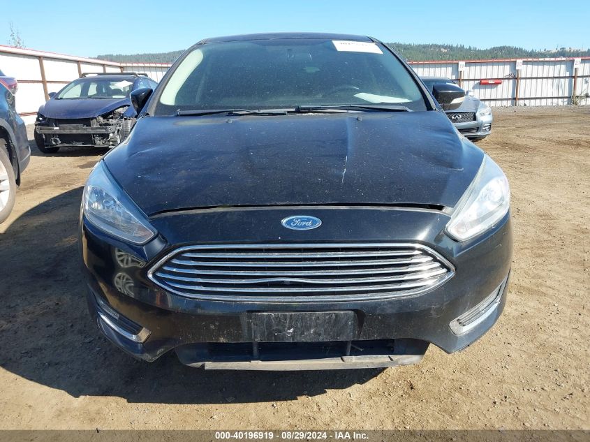 2016 Ford Focus Titanium VIN: 1FADP3J20GL369292 Lot: 40196919