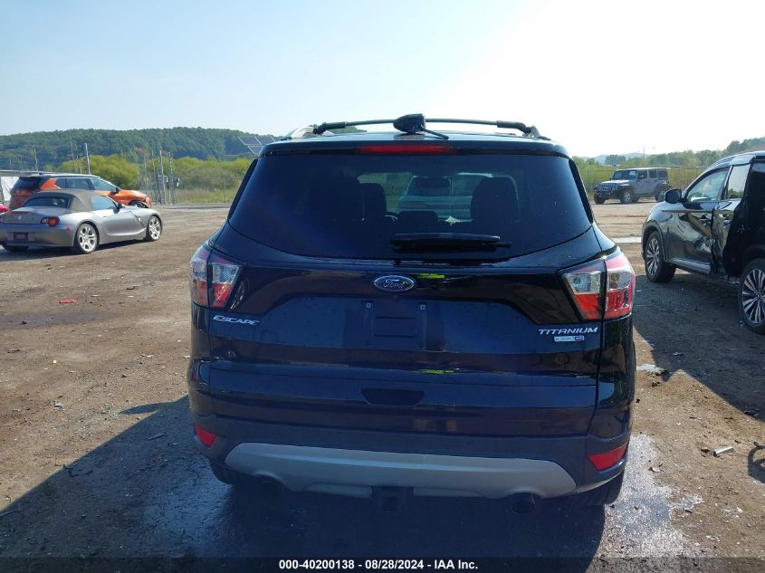 2018 Ford Escape Titanium VIN: 1FMCU9J94JUA49517 Lot: 40200138