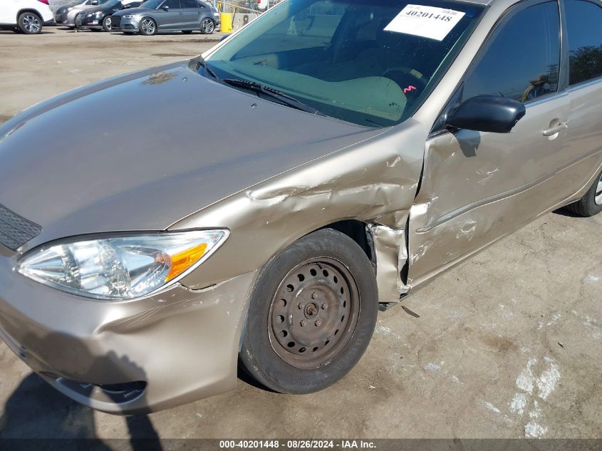 2004 Toyota Camry Le VIN: JTDBE32K540250558 Lot: 40201448