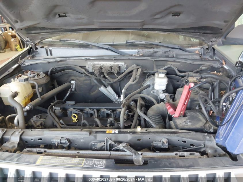 2009 Mercury Mariner I4 VIN: 4M2CU81769KJ04001 Lot: 40202789