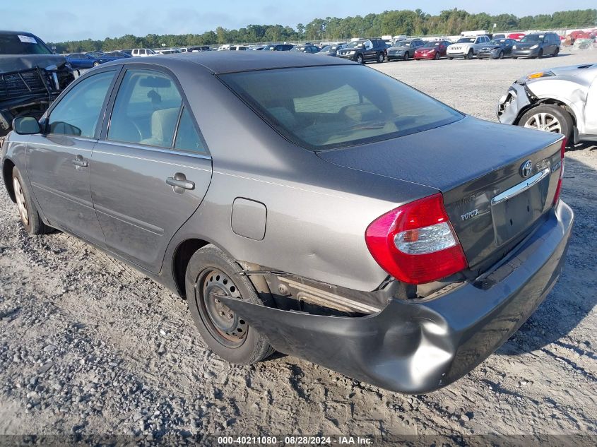 2003 Toyota Camry Le VIN: 4T1BE32K93U672898 Lot: 40211080