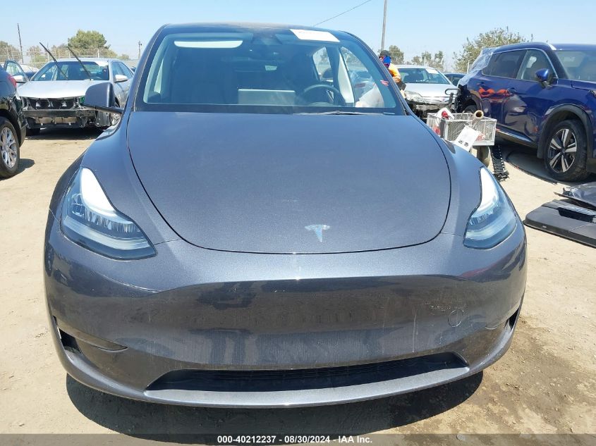 2023 Tesla Model Y Awd/Long Range Dual Motor All-Wheel Drive VIN: 7SAYGDEE8PA079956 Lot: 40212237