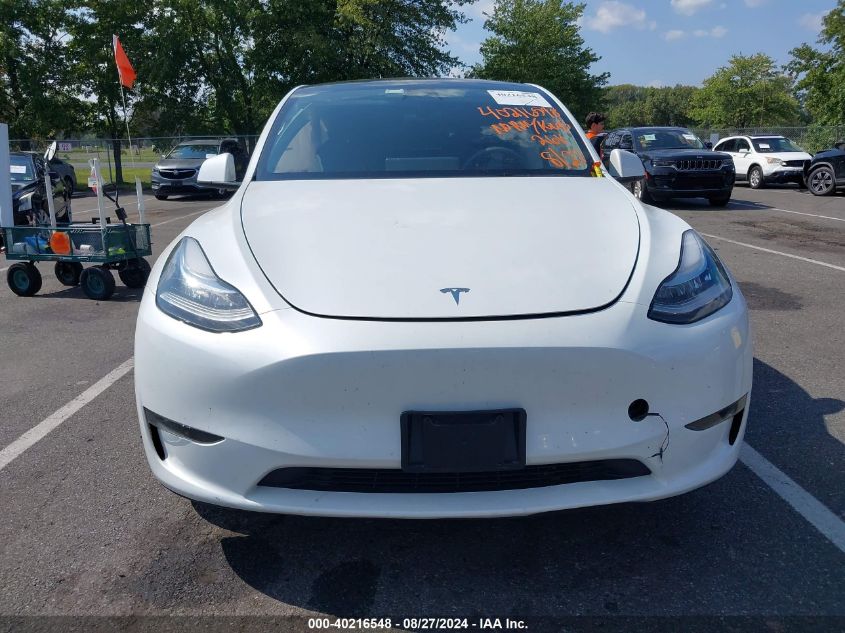 2023 Tesla Model Y Awd/Long Range Dual Motor All-Wheel Drive VIN: 7SAYGDEE7PA097672 Lot: 40216548