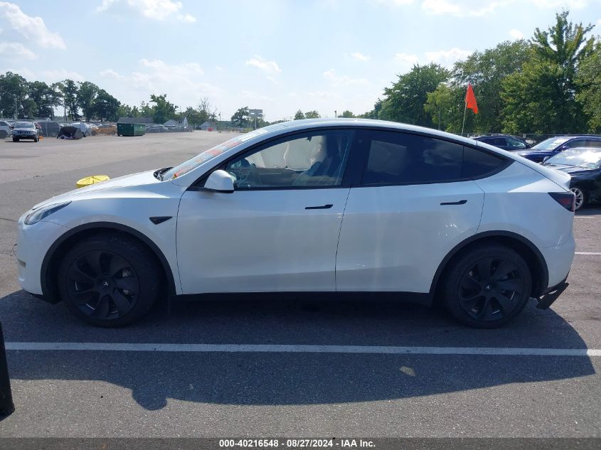 2023 Tesla Model Y Awd/Long Range Dual Motor All-Wheel Drive VIN: 7SAYGDEE7PA097672 Lot: 40216548