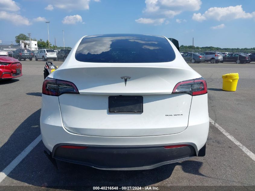 2023 Tesla Model Y Awd/Long Range Dual Motor All-Wheel Drive VIN: 7SAYGDEE7PA097672 Lot: 40216548