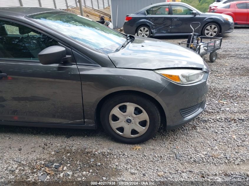 2015 Ford Focus S VIN: 1FADP3E23FL304011 Lot: 40217938