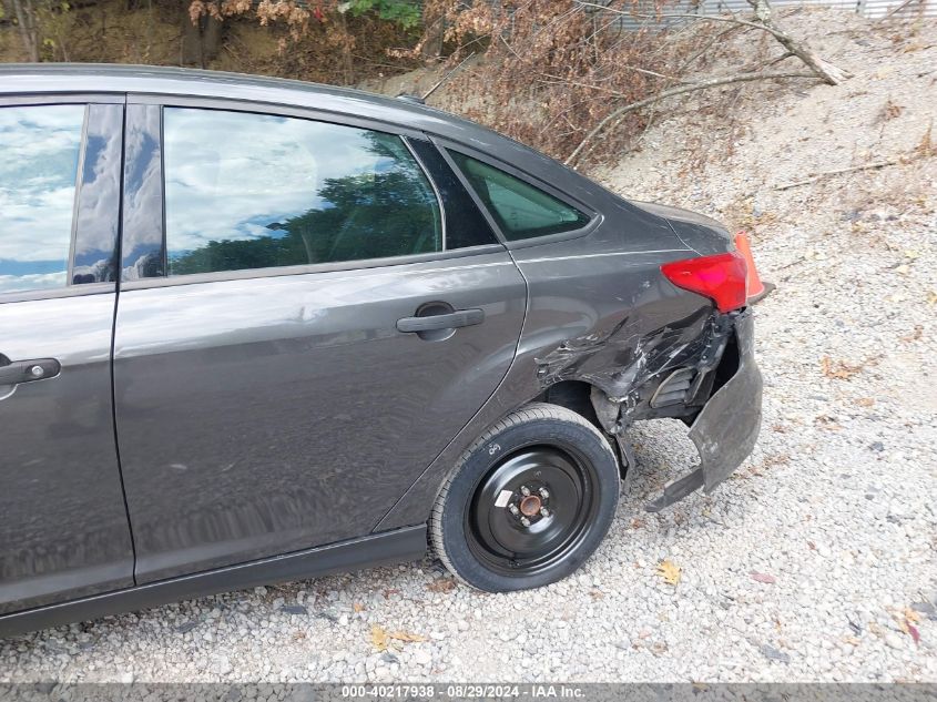 2015 Ford Focus S VIN: 1FADP3E23FL304011 Lot: 40217938