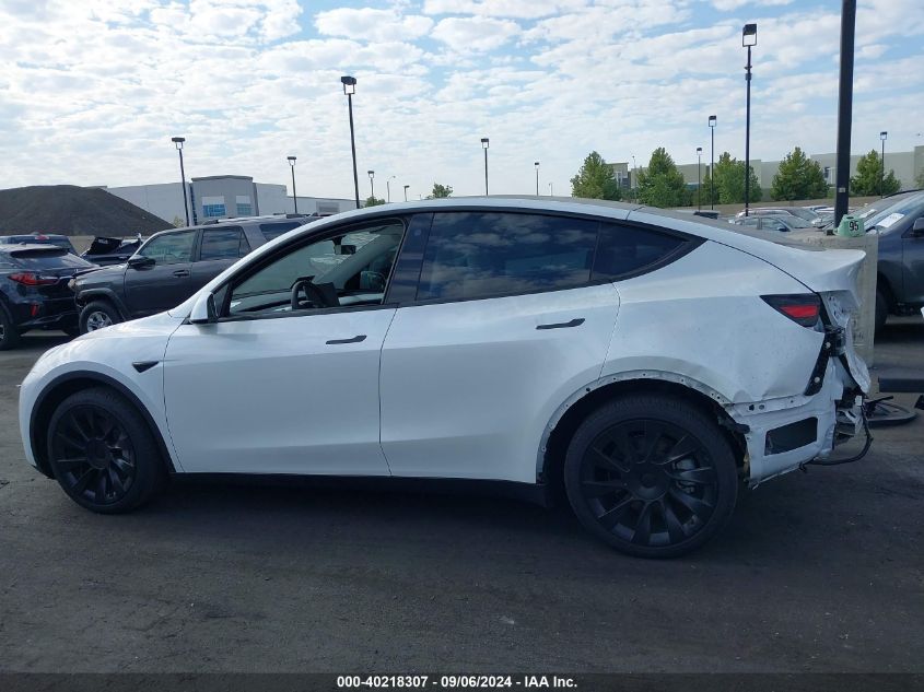 2023 Tesla Model Y Awd/Long Range Dual Motor All-Wheel Drive VIN: 7SAYGDEE9PA071445 Lot: 40218307