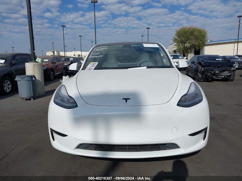 2023 Tesla Model Y Awd/Long Range Dual Motor All-Wheel Drive VIN: 7SAYGDEE9PA071445 Lot: 40218307