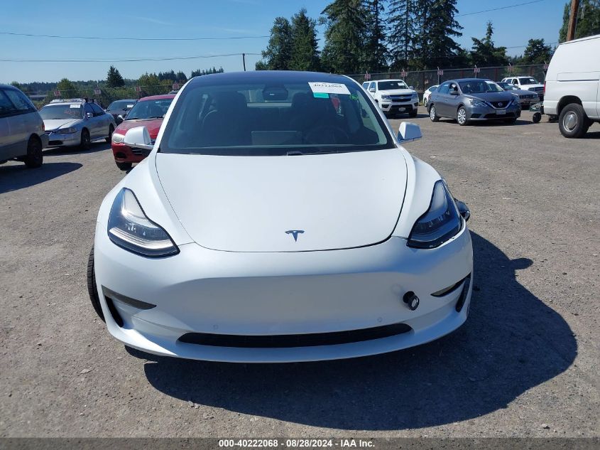 2018 Tesla Model 3 Long Range/Mid Range VIN: 5YJ3E1EA7JF014809 Lot: 40222068