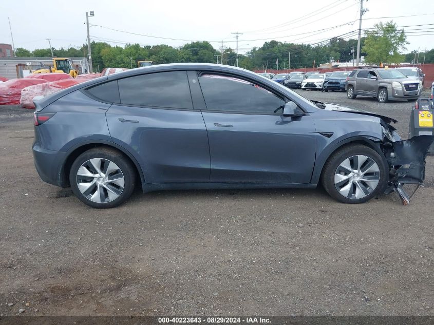 2023 Tesla Model Y Awd/Long Range Dual Motor All-Wheel Drive VIN: 7SAYGDEE8PF804409 Lot: 40223643