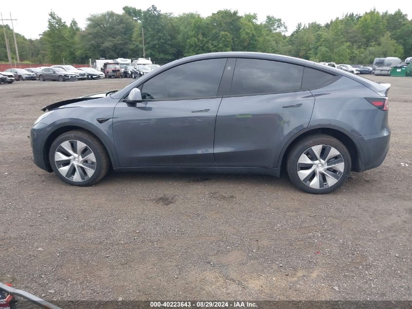 2023 Tesla Model Y Awd/Long Range Dual Motor All-Wheel Drive VIN: 7SAYGDEE8PF804409 Lot: 40223643