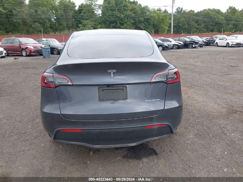 2023 Tesla Model Y Awd/Long Range Dual Motor All-Wheel Drive VIN: 7SAYGDEE8PF804409 Lot: 40223643