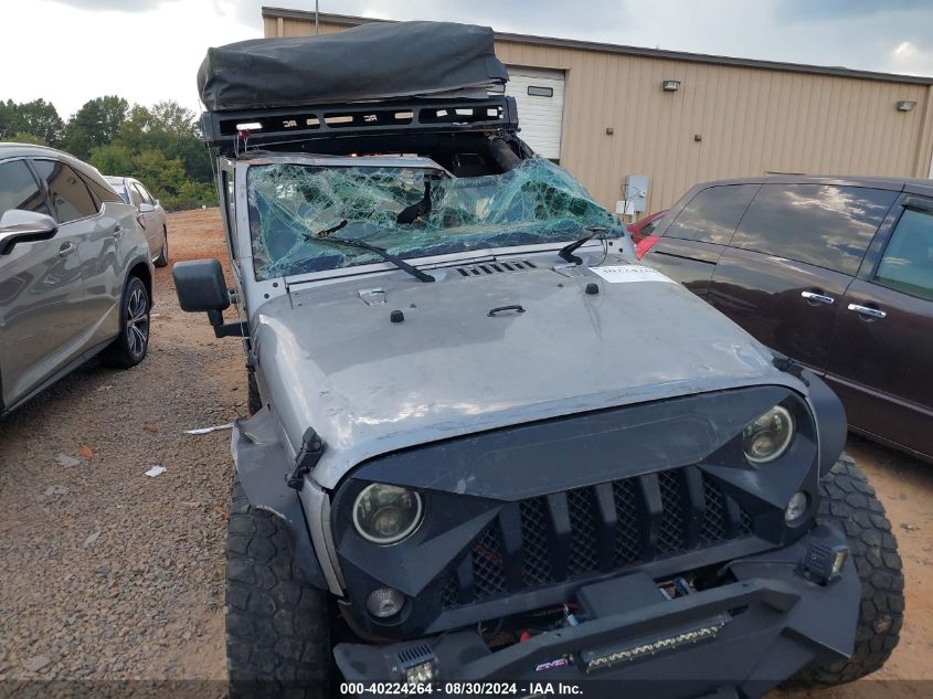 2014 Jeep Wrangler Unlimited Sahara VIN: 1C4BJWEG1EL256376 Lot: 40224264