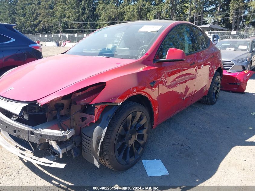 2023 Tesla Model Y Awd/Long Range Dual Motor All-Wheel Drive VIN: 7SAYGDEE5PF809244 Lot: 40225154