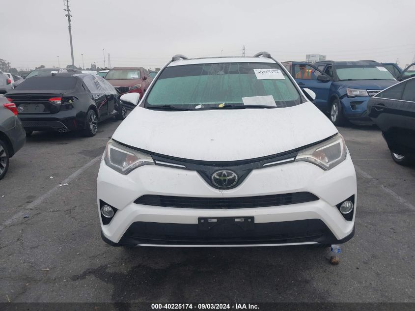 2018 Toyota Rav4 Xle VIN: 2T3WFREV0JW460385 Lot: 40225174