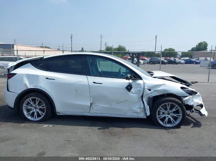 2023 Tesla Model Y Awd/Long Range Dual Motor All-Wheel Drive VIN: 7SAYGDEEXPA033027 Lot: 40225813