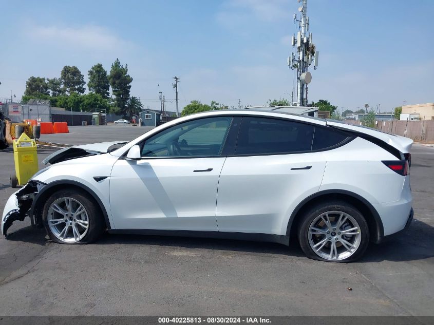 2023 Tesla Model Y Awd/Long Range Dual Motor All-Wheel Drive VIN: 7SAYGDEEXPA033027 Lot: 40225813