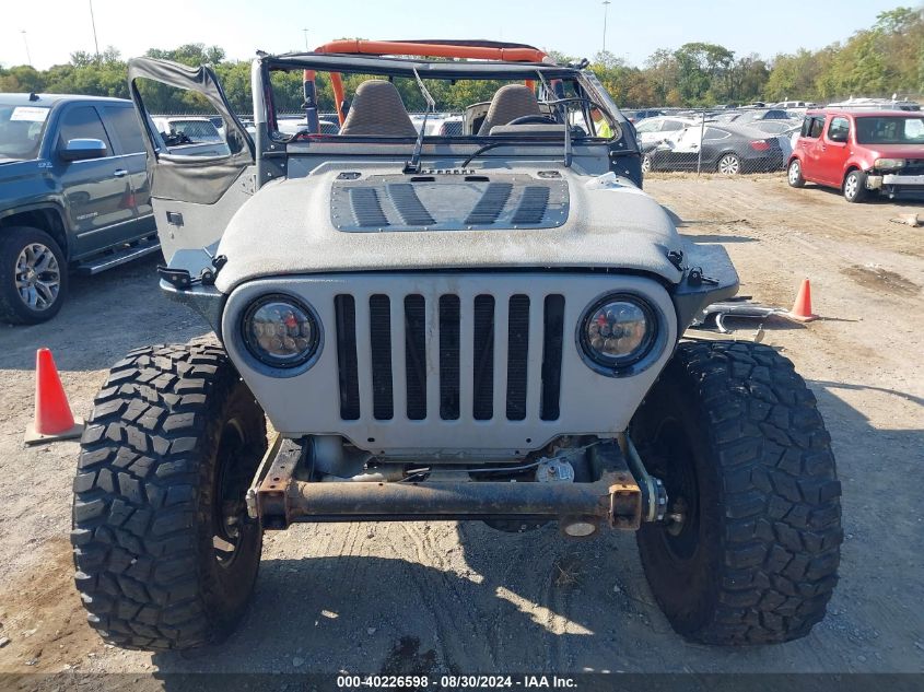 2000 Jeep Wrangler Sport VIN: 1J4FA49S4YP792783 Lot: 40226598