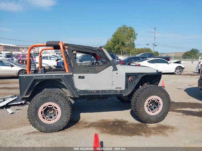 2000 Jeep Wrangler Sport VIN: 1J4FA49S4YP792783 Lot: 40226598