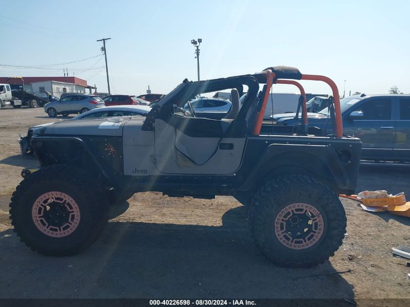 2000 Jeep Wrangler Sport VIN: 1J4FA49S4YP792783 Lot: 40226598