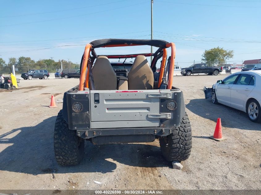 2000 Jeep Wrangler Sport VIN: 1J4FA49S4YP792783 Lot: 40226598