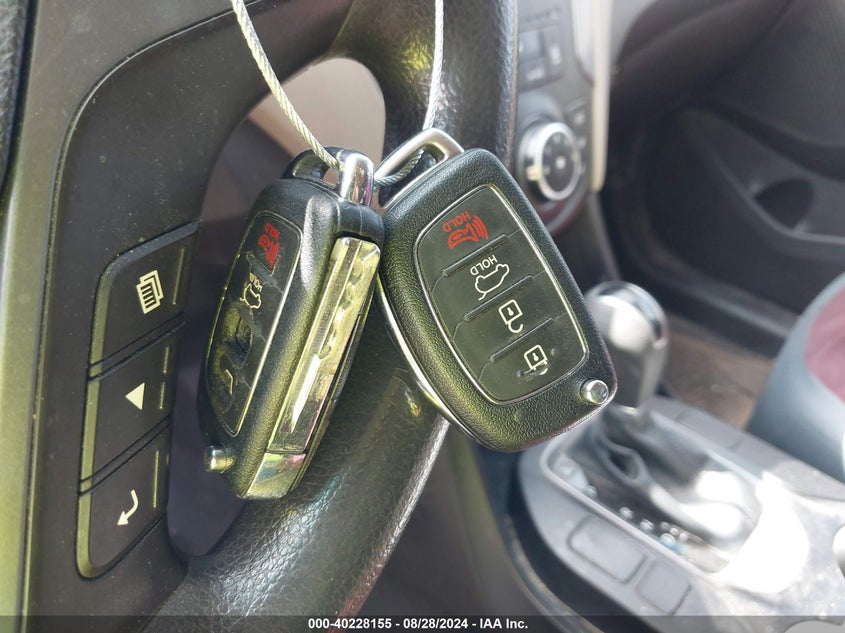 2015 Hyundai Santa Fe Sport 2.4L VIN: 5XYZTDLB0FG269587 Lot: 40228155