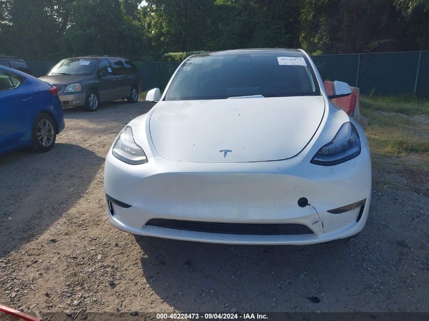 2023 Tesla Model Y Awd/Long Range Dual Motor All-Wheel Drive VIN: 7SAYGDEE4PA042290 Lot: 40228473