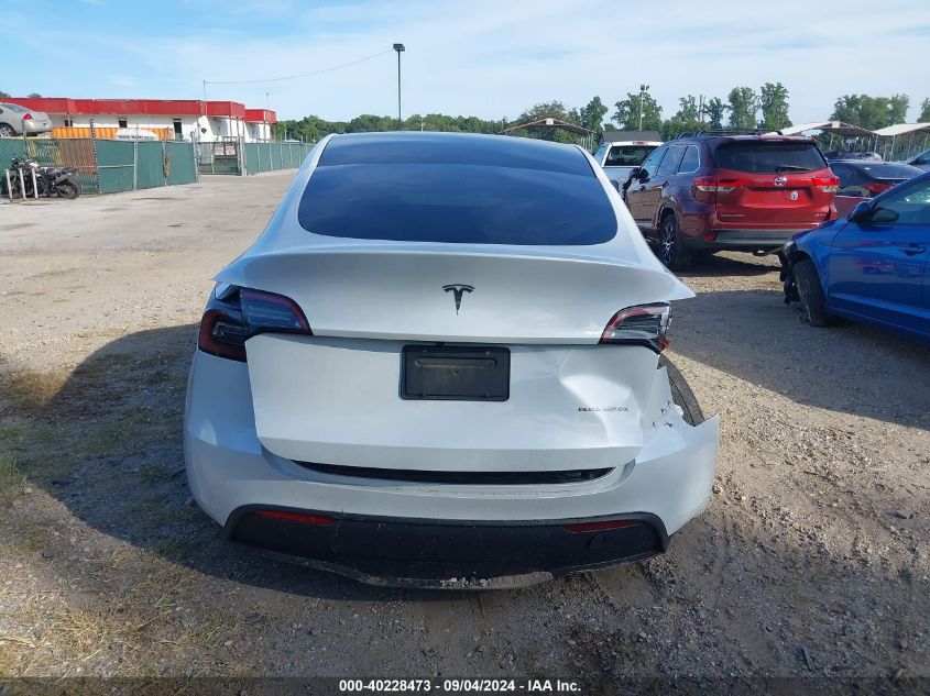 2023 Tesla Model Y Awd/Long Range Dual Motor All-Wheel Drive VIN: 7SAYGDEE4PA042290 Lot: 40228473