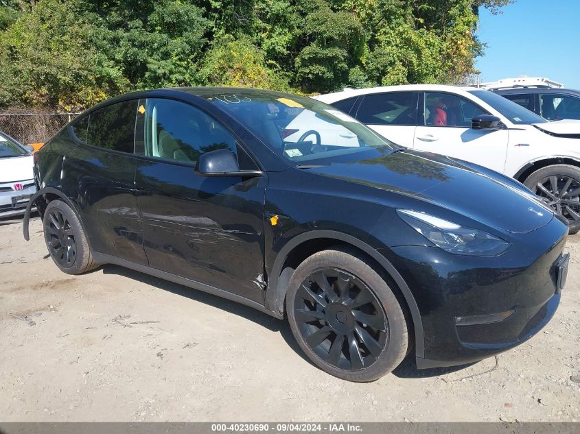 2023 Tesla Model Y Awd/Long Range Dual Motor All-Wheel Drive VIN: 7SAYGDEE5PF753712 Lot: 40230690