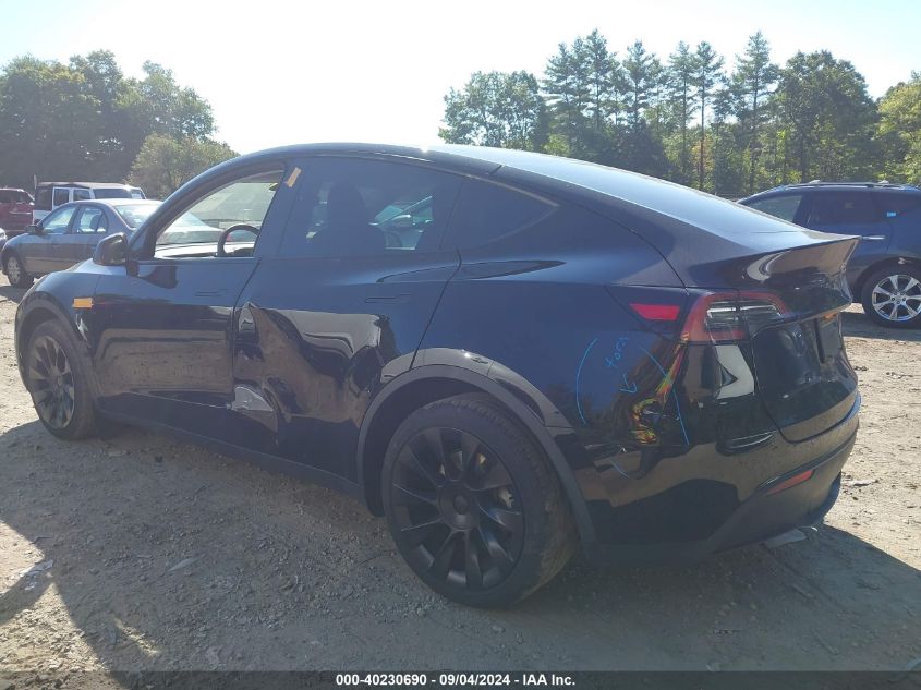 2023 Tesla Model Y Awd/Long Range Dual Motor All-Wheel Drive VIN: 7SAYGDEE5PF753712 Lot: 40230690