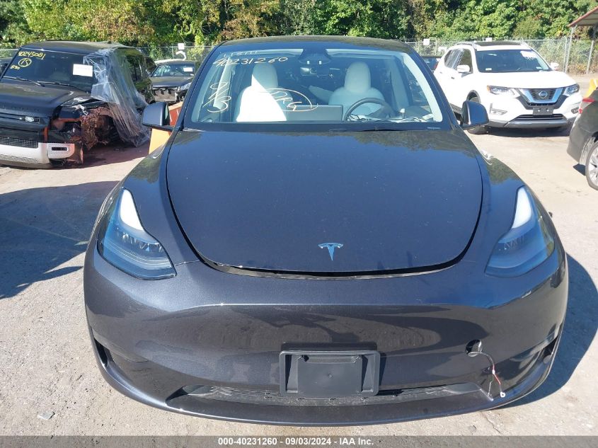 2024 Tesla Model Y Long Range Dual Motor All-Wheel Drive VIN: 7SAYGDEE1RA221888 Lot: 40231260