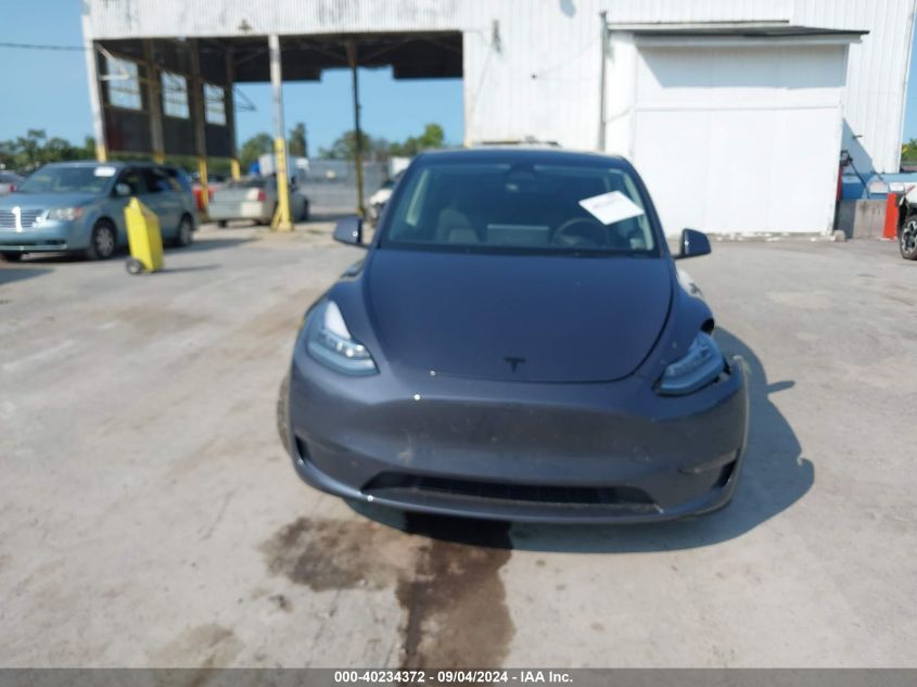 2023 Tesla Model Y Awd/Long Range Dual Motor All-Wheel Drive VIN: 7SAYGDEE4PA103251 Lot: 40234372